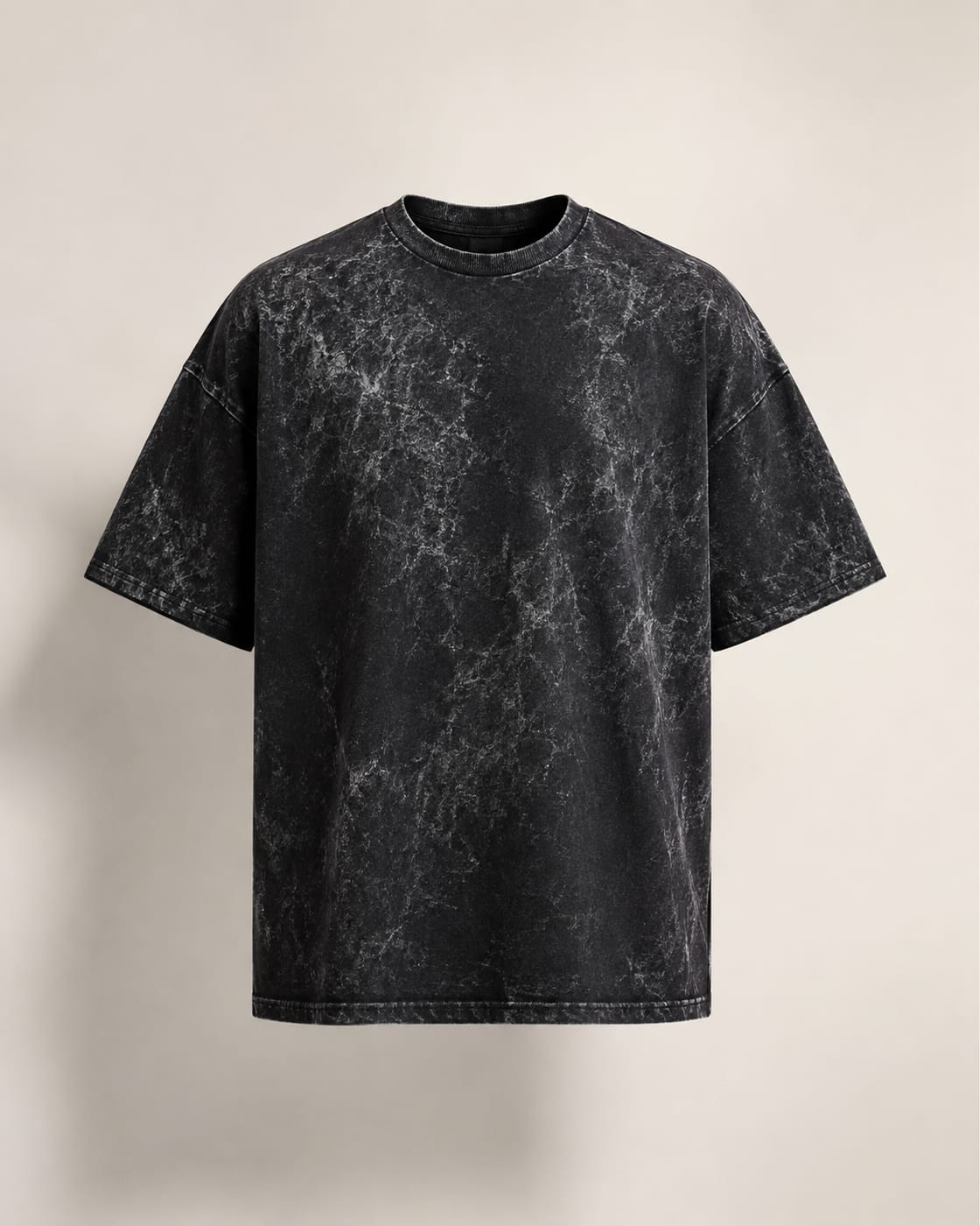 Charcoal 240 GSM oversized acid wash t-shirt laid flat, front view, showing the marbled vintage wash