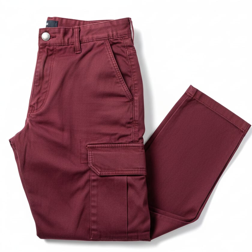 Burgundy cargo trousers folded flat