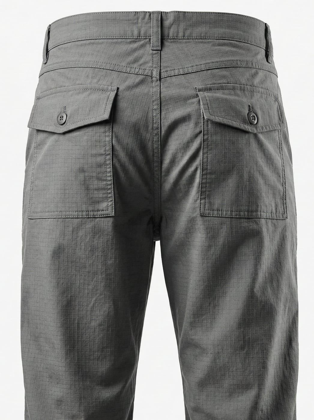 Grey ripstop trousers, back view showing flap pockets