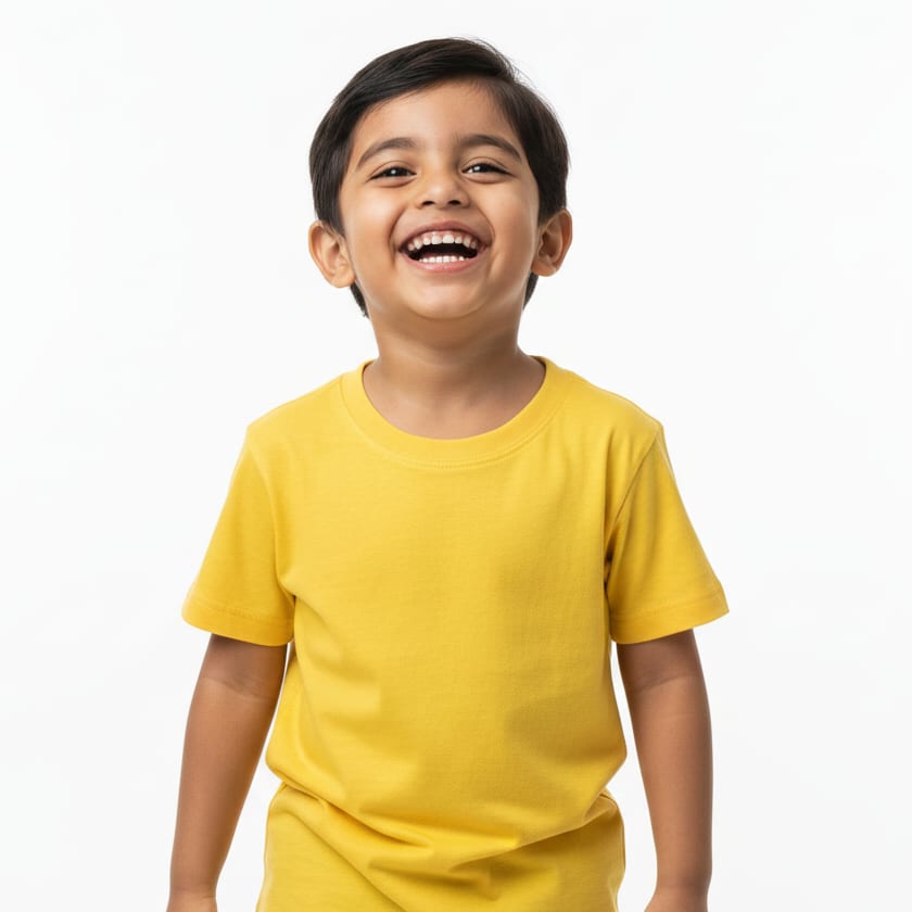 Child wearing a yellow cotton kids’ t-shirt