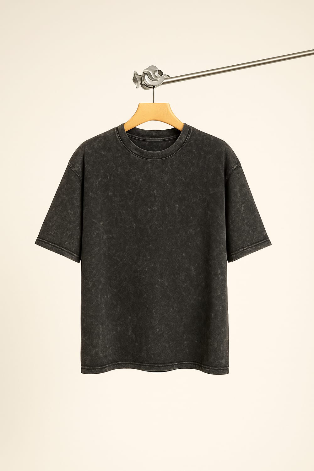 Acid-wash black t-shirt on hanger