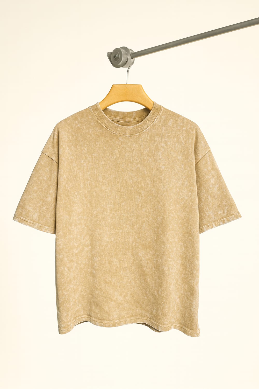 Acid-wash tan t-shirt on hanger